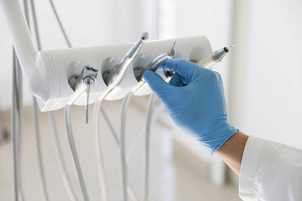 Professional Tooth Extraction technician working in Pflugerville, TX